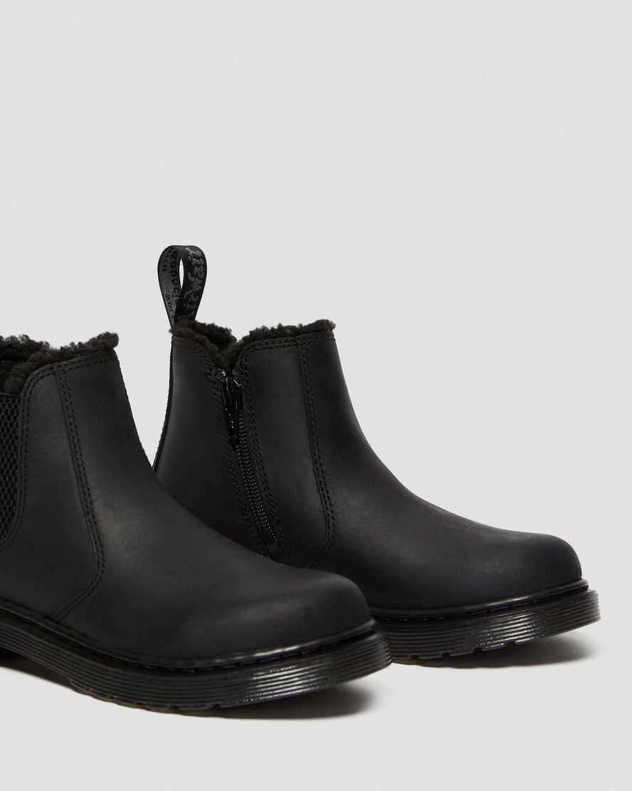 Černé dětské boty dr. martens 2976 s podšívkou z umělé kožešiny chelsea