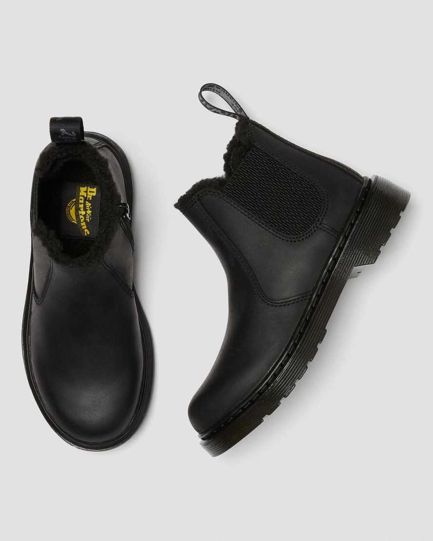 Černé dětské boty dr. martens 2976 s podšívkou z umělé kožešiny chelsea