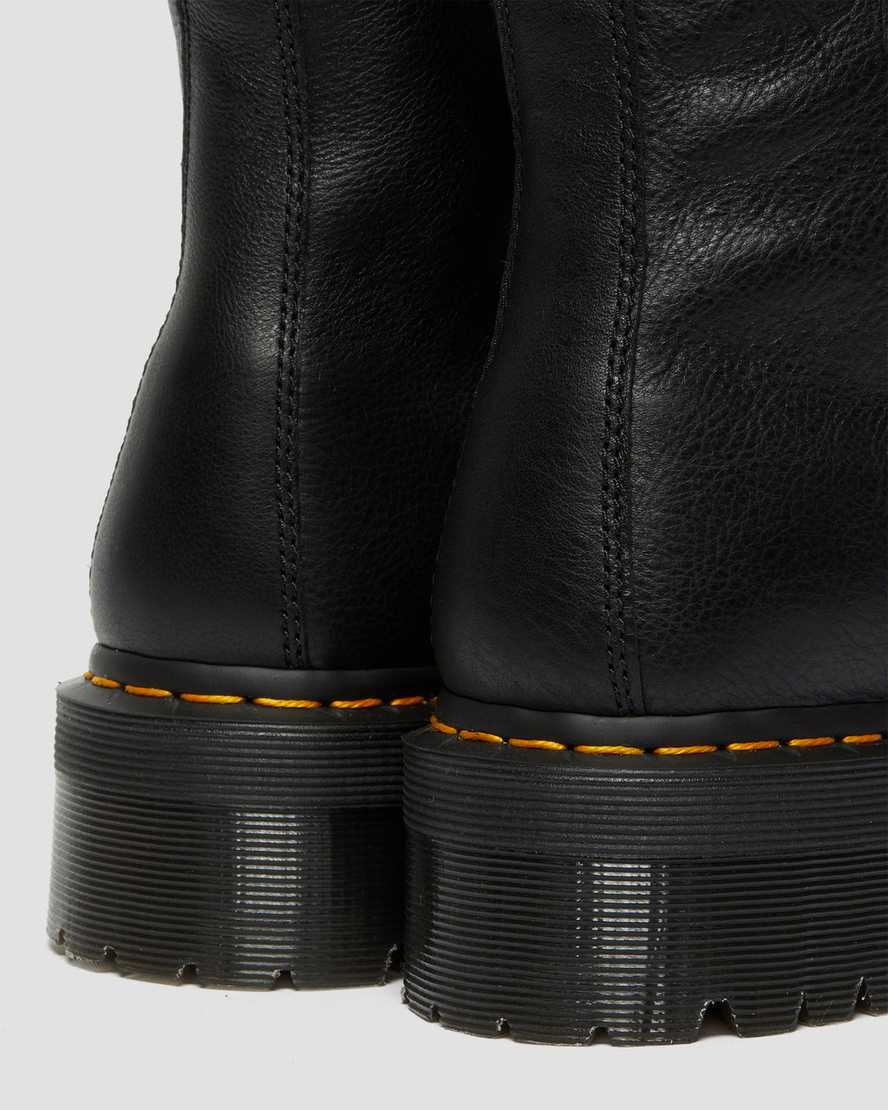 Černé pánské boty na platformě s podšívkou z umělé kožešiny dr. martens jadon