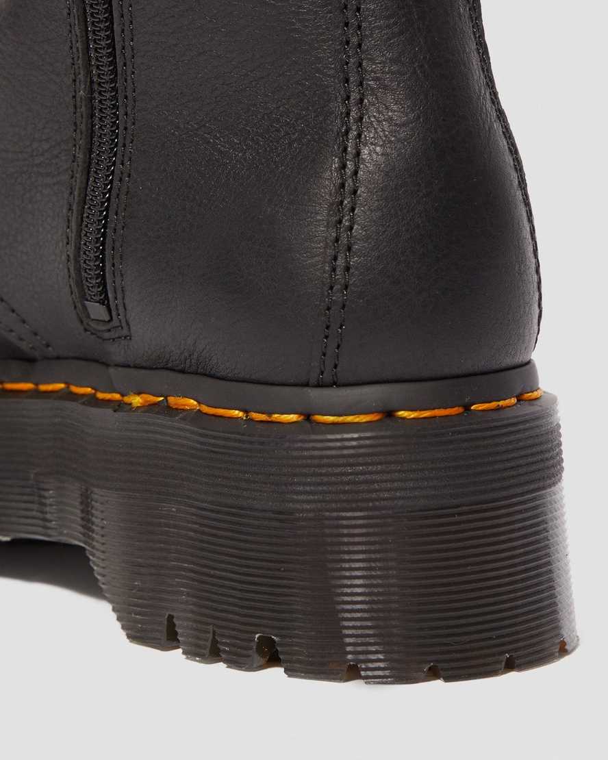 Černé pánské boty na platformě s podšívkou z umělé kožešiny dr. martens jadon