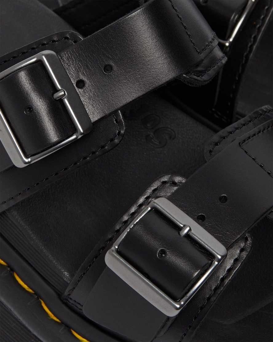 Černé pánské pantofle dr. martens myles brando s přezkou