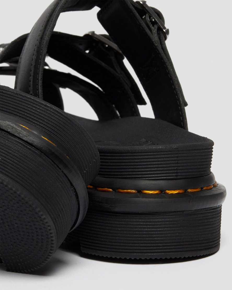 Černé pánské pantofle dr. martens ryker ii s hardwarovým páskem