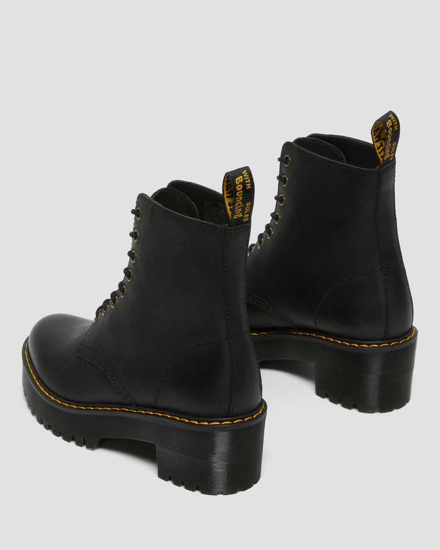 Černé dámské boty na podpatku dr. martens shriver hi wyoming