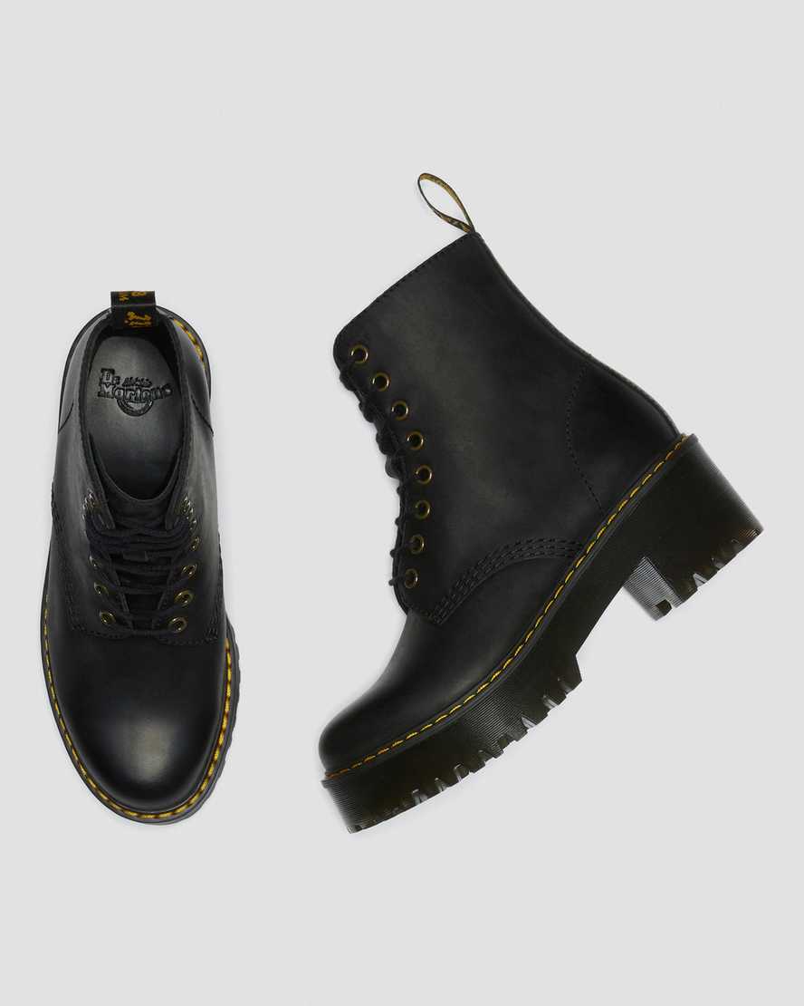 Černé dámské boty na podpatku dr. martens shriver hi wyoming