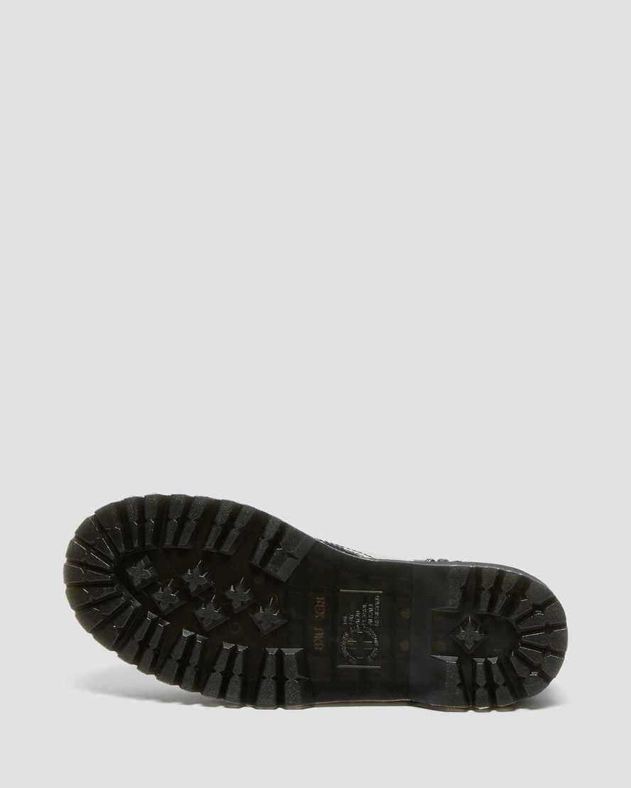Černé dámské boty na platformě dr. martens jadon s puntíkovaným vzorem a hladkým povrchem